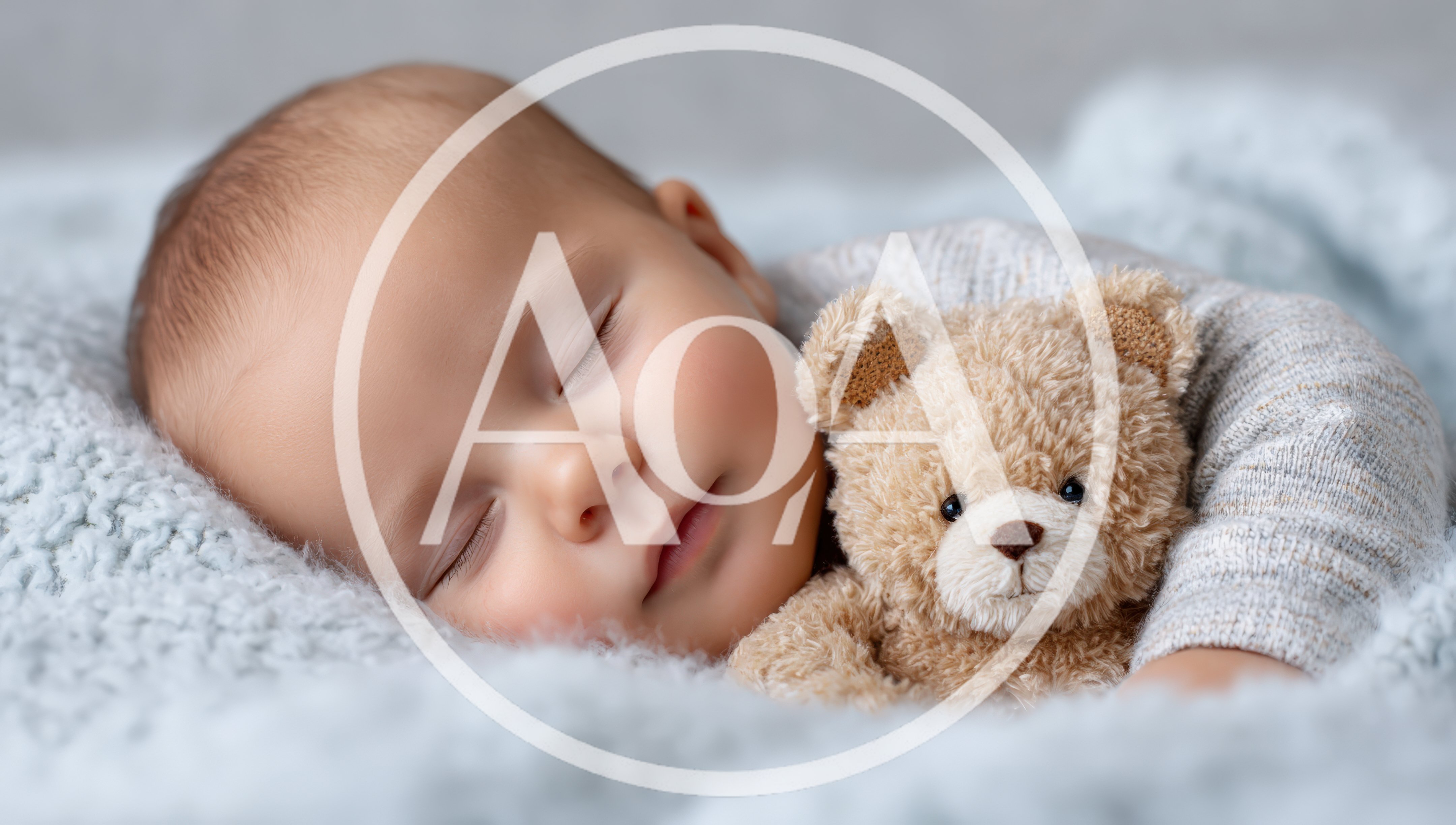 Sleeping Baby Cuddling A Small Teddy Bear