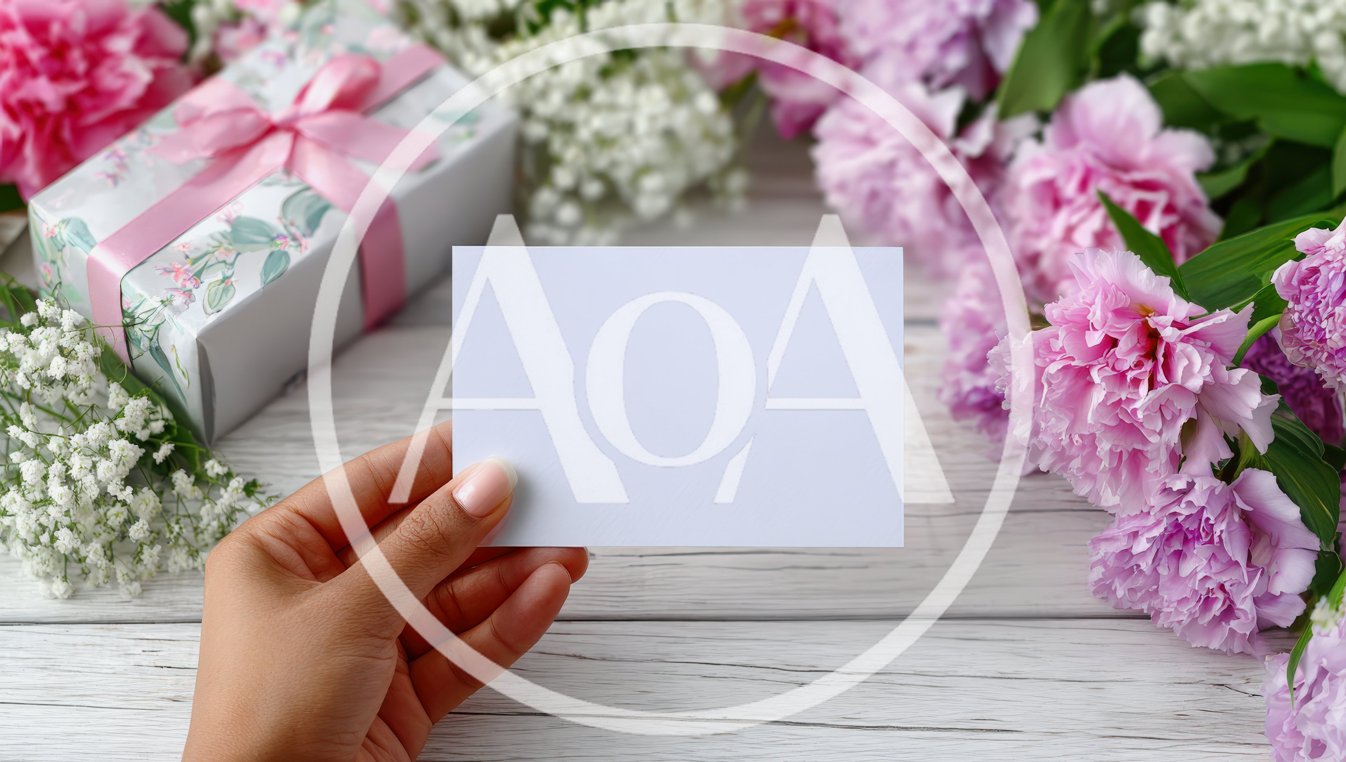 Hand Holding Blank Card With Peonies And Gift