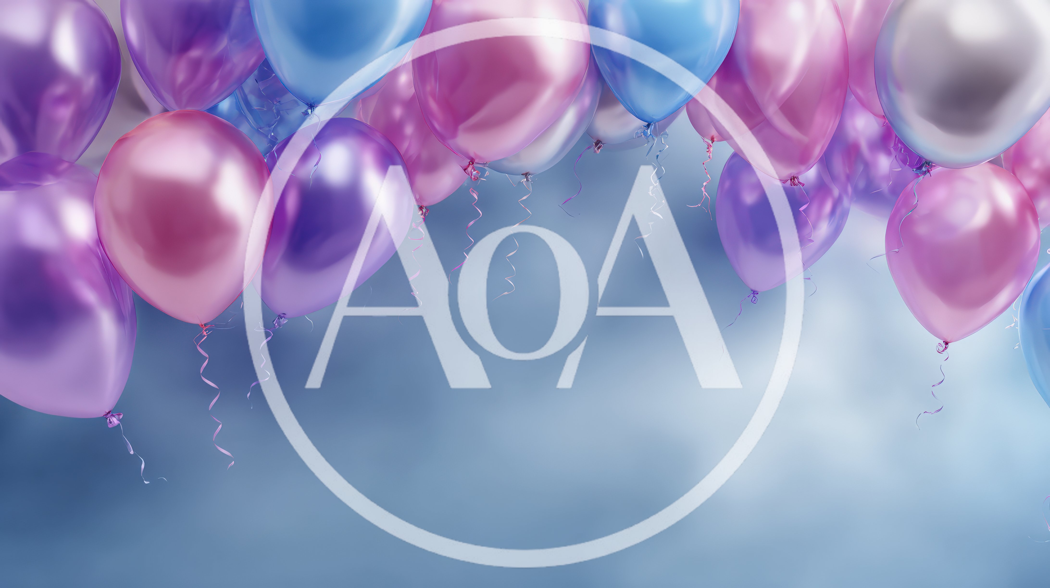 Floating Metallic Balloons Against A Soft Blue Background