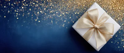 White Gift Box With Gold Ribbon On Blue Background