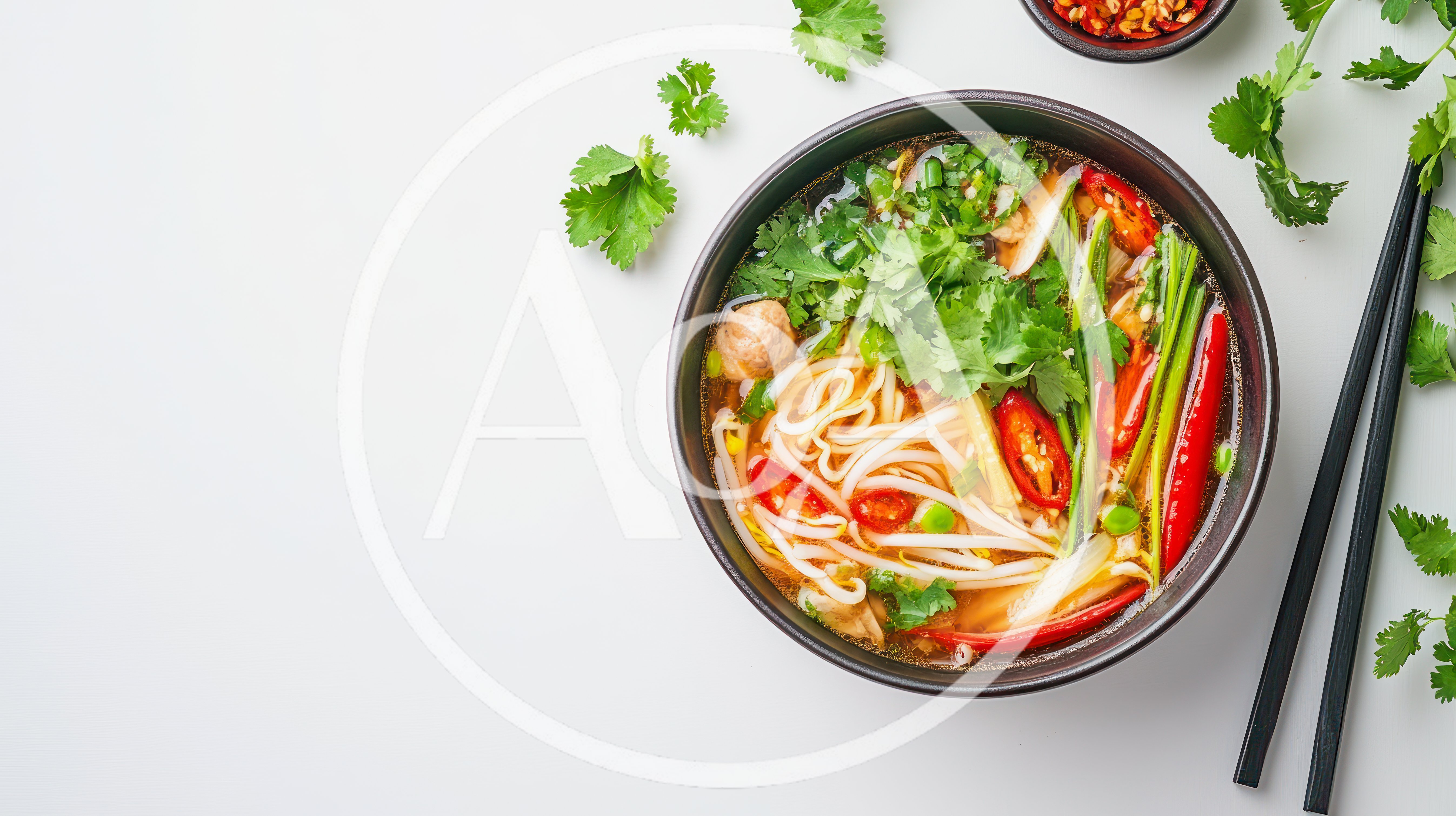 Bowl Of Spicy Asian Noodle Soup With Cilantro