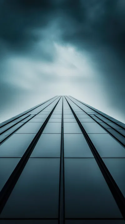 Low Angle View Of Modern Glass Skyscraper