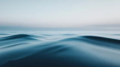 Calm Blue Ocean Waves At Twilight