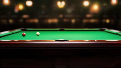 Billiard Table With Two Balls In Dimly Lit Bar