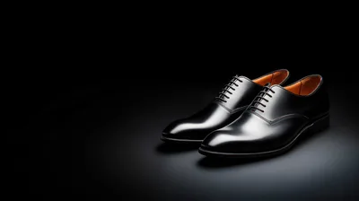 Pair Of Elegant Black Leather Oxford Shoes