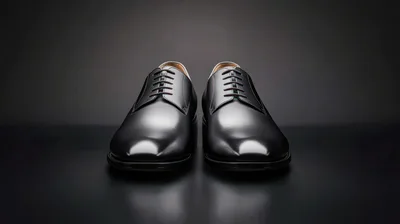 Pair Of Polished Black Leather Dress Shoes