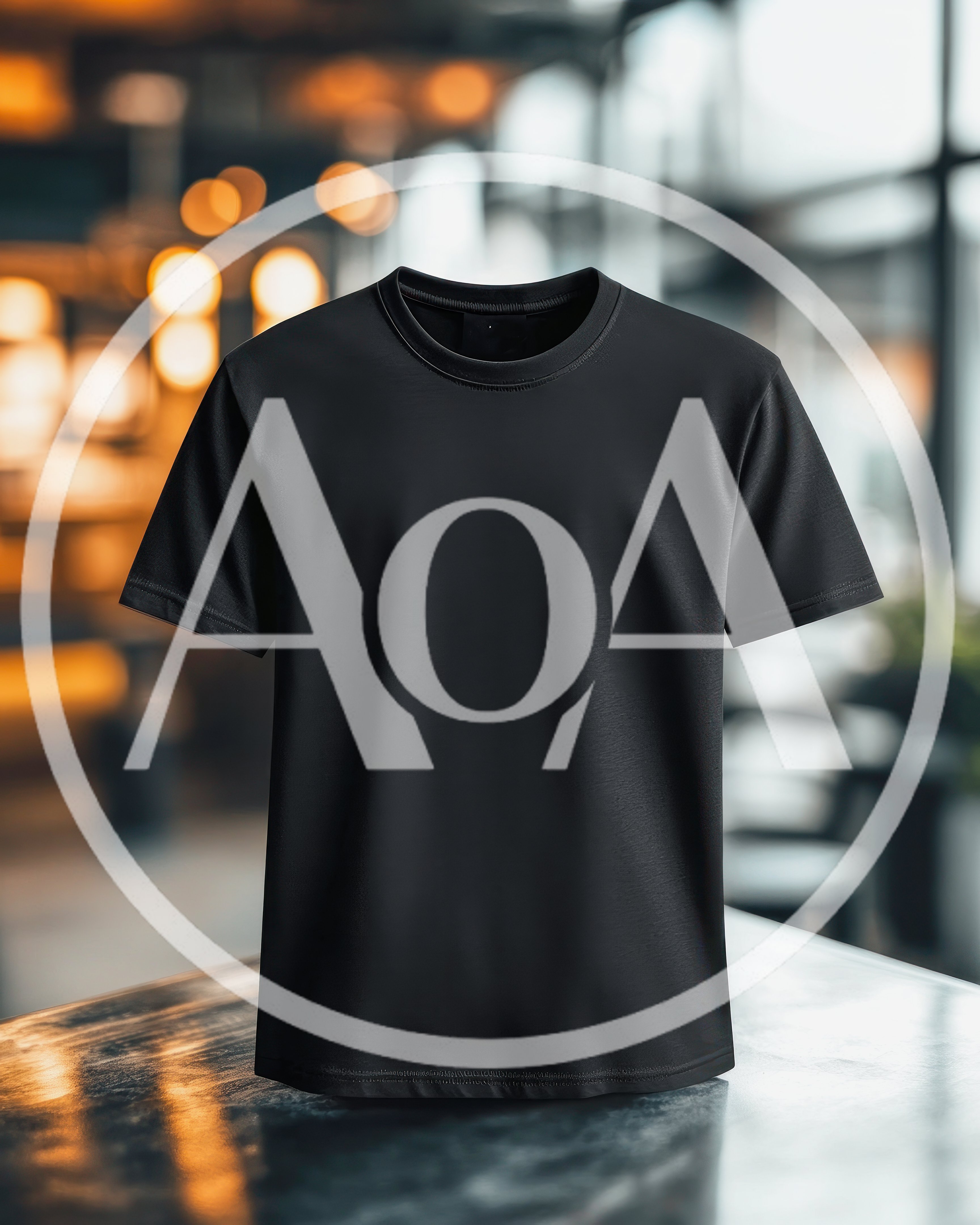 Black T-Shirt Mockup On A Table