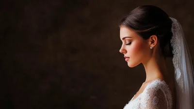 Profile Portrait of a Beautiful Bride in Lace Veil