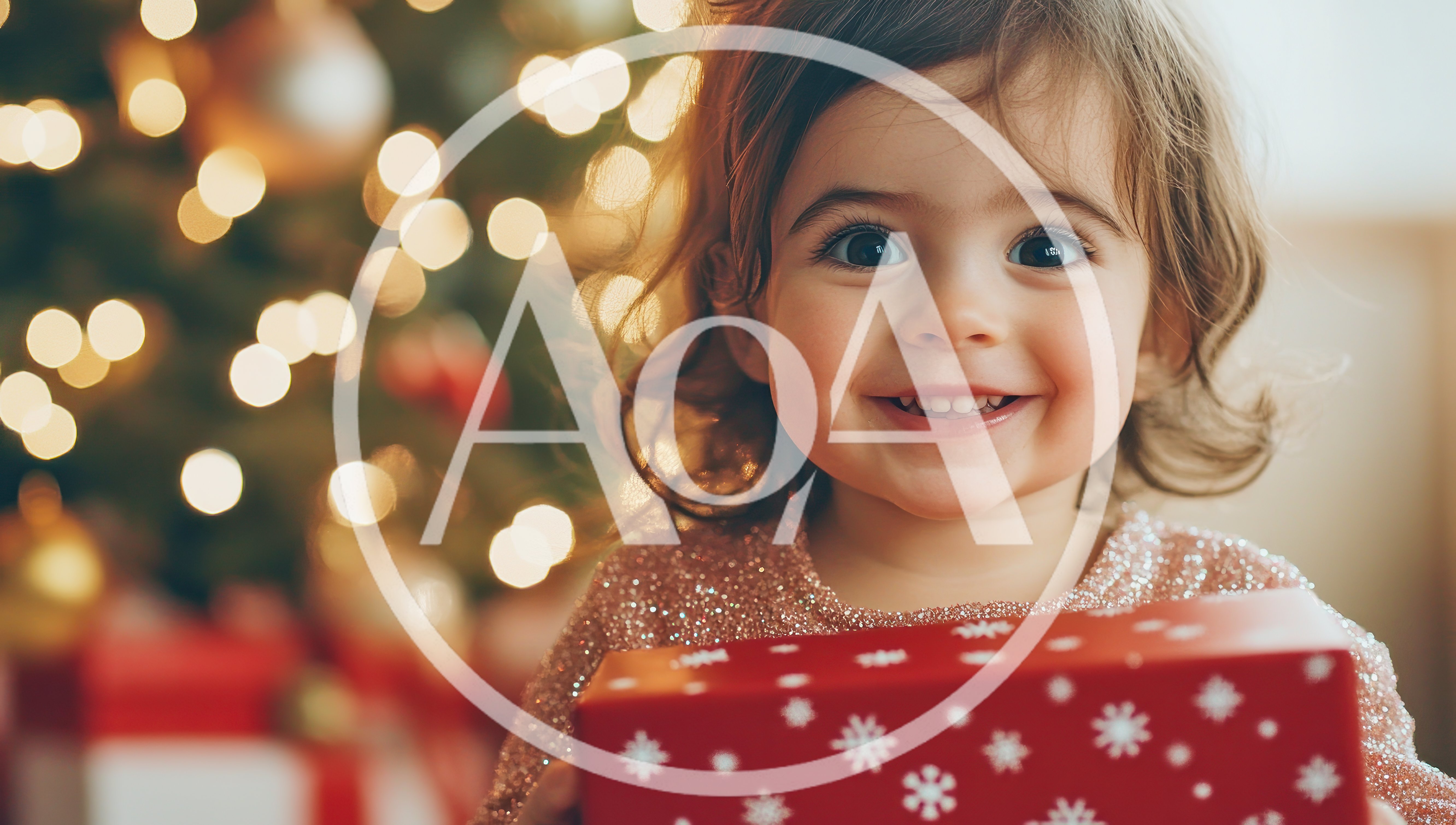 Happy Toddler Girl Holding Christmas Gift