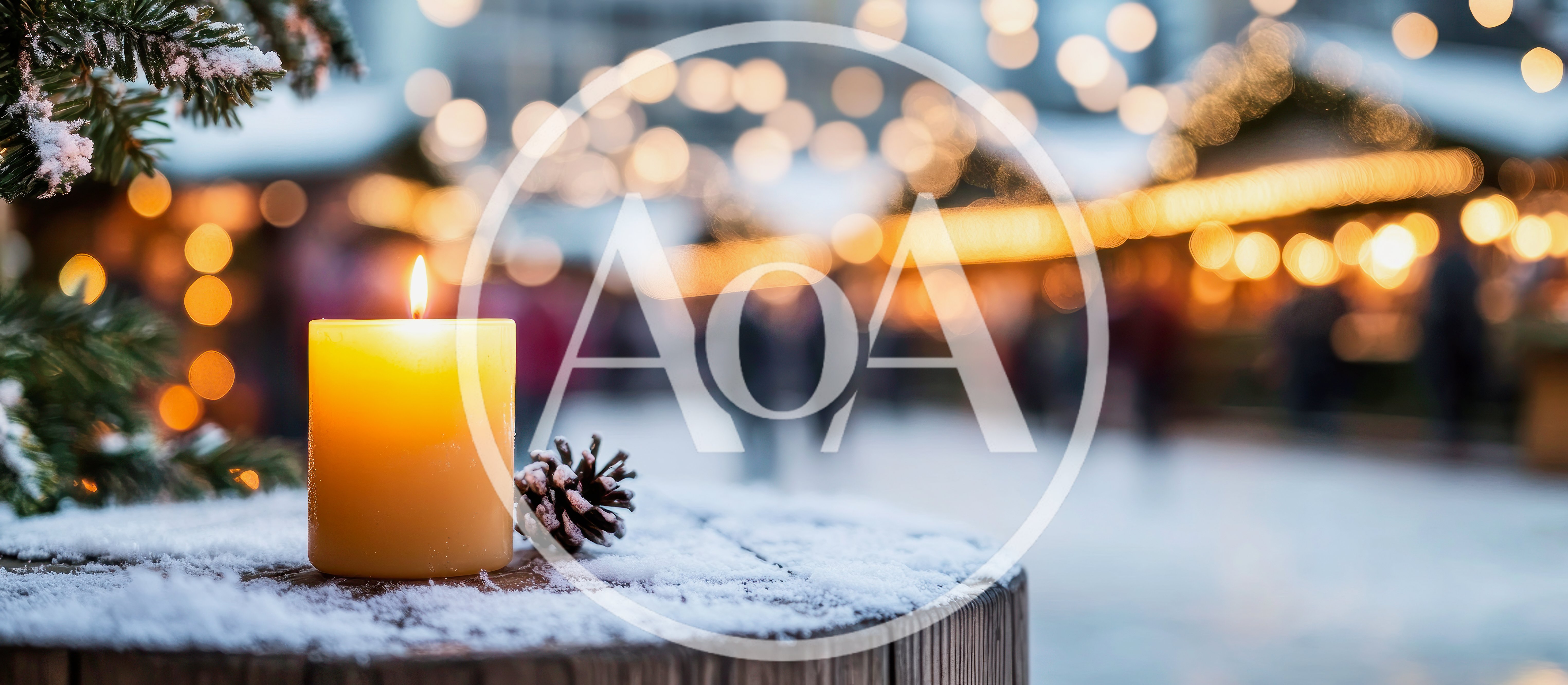 Lit Candle And Pinecone On Snowy Surface At Christmas Market