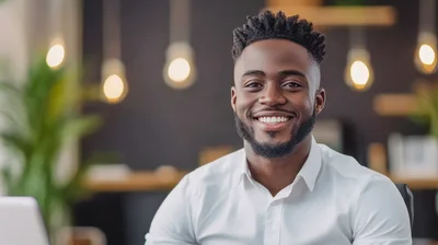Smiling African American Professional Man In Office