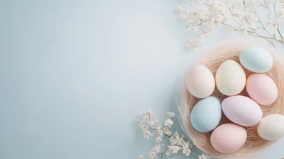 Pastel Easter Eggs In A Nest With Flowers