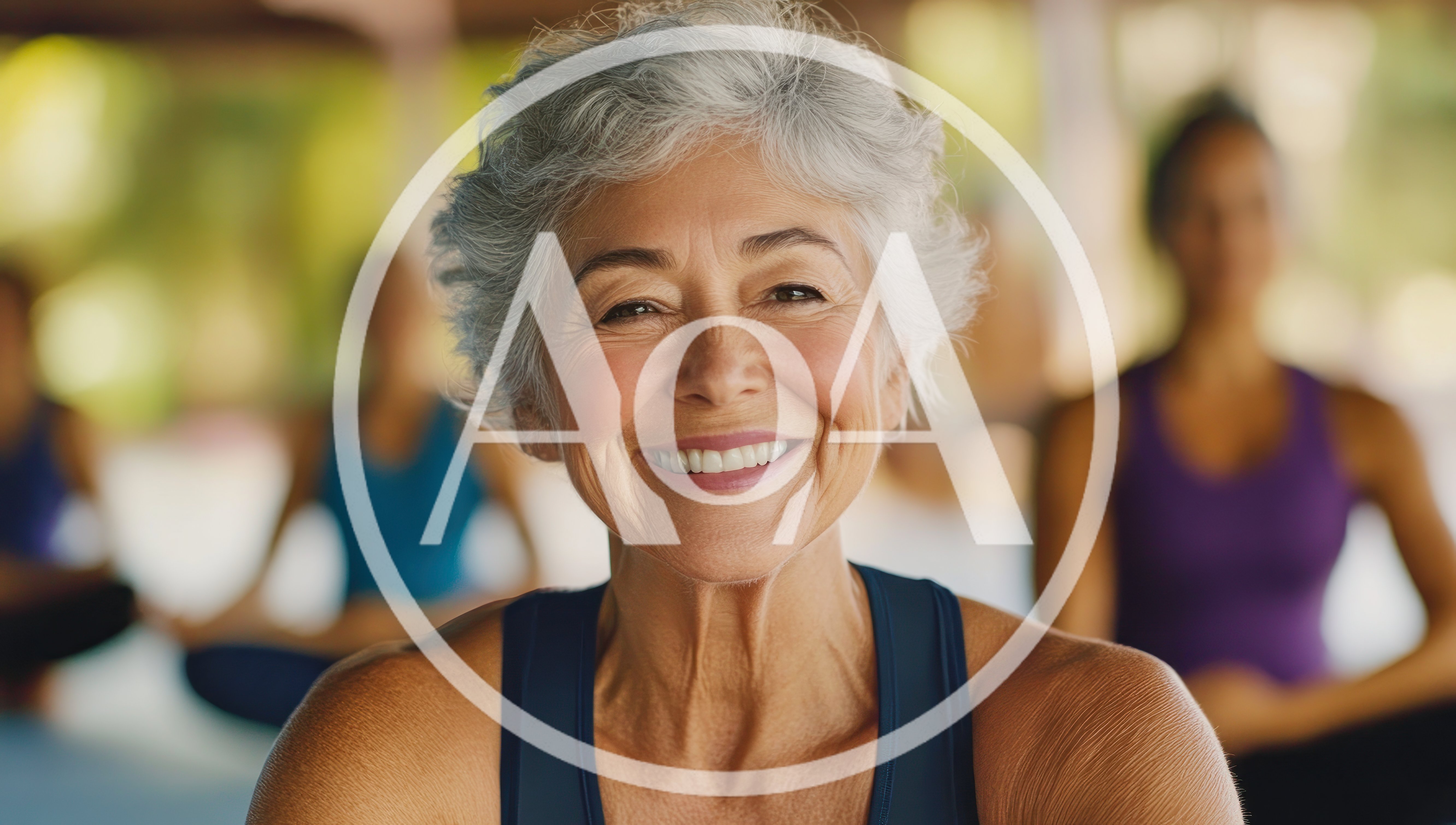 Smiling Senior Woman Practicing Yoga In A Studio