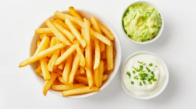 Bowl Of Golden French Fries With Two Dips