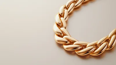 Golden Chain Necklace On A Neutral Background