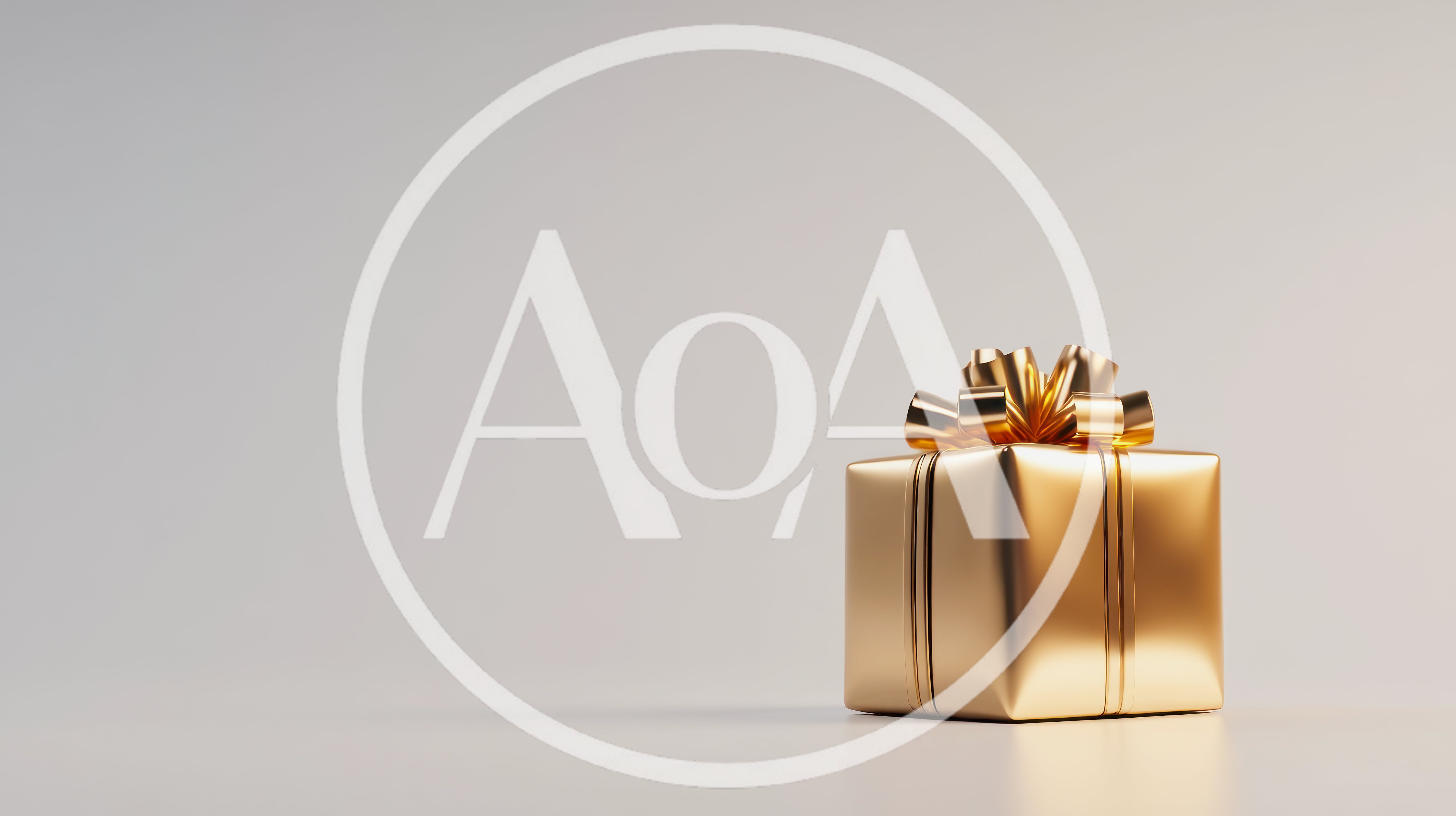 Golden Gift Box With Ribbon On Neutral Background