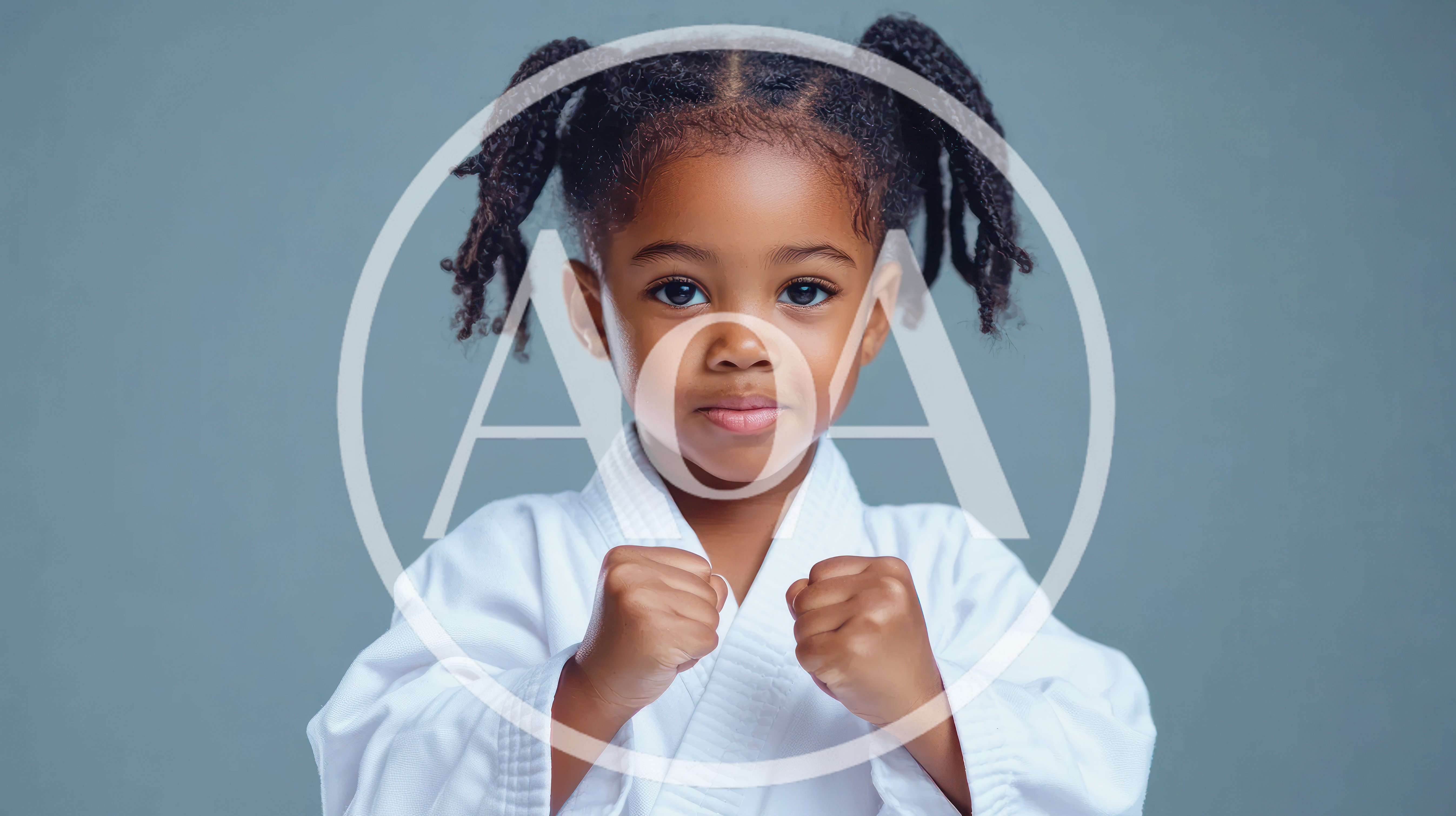 Young Girl Wearing Karate Gi In Fighting Stance