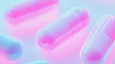 Abstract 3D Rendered Pink And Blue Medical Capsules