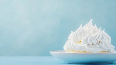 Meringue Topped Dessert on a White Plate