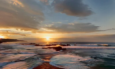 Aerial View Of Ocean Waves Crashing At Sunset