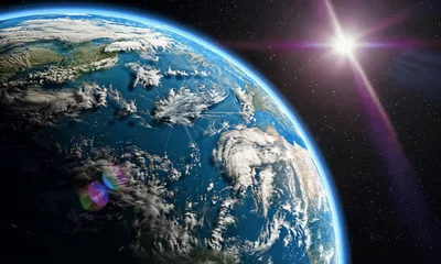 Earth Rotating In Space With Bright Sun Flare