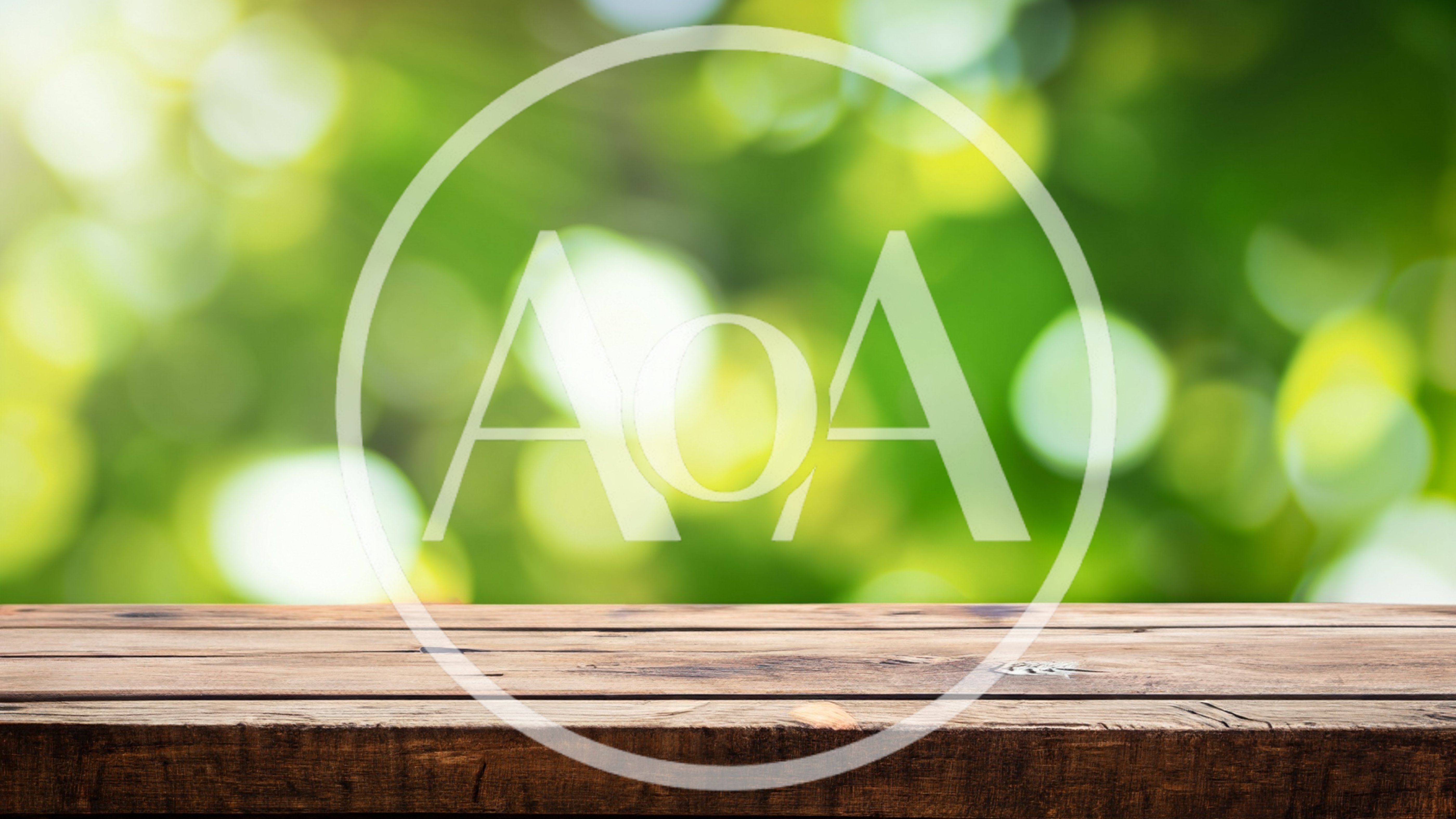 Empty Wooden Table Against Blurred Green Nature Background