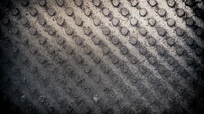 Textured Metal Surface With Raised Circular Studs