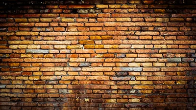 Weathered Red Brick Wall Texture Background