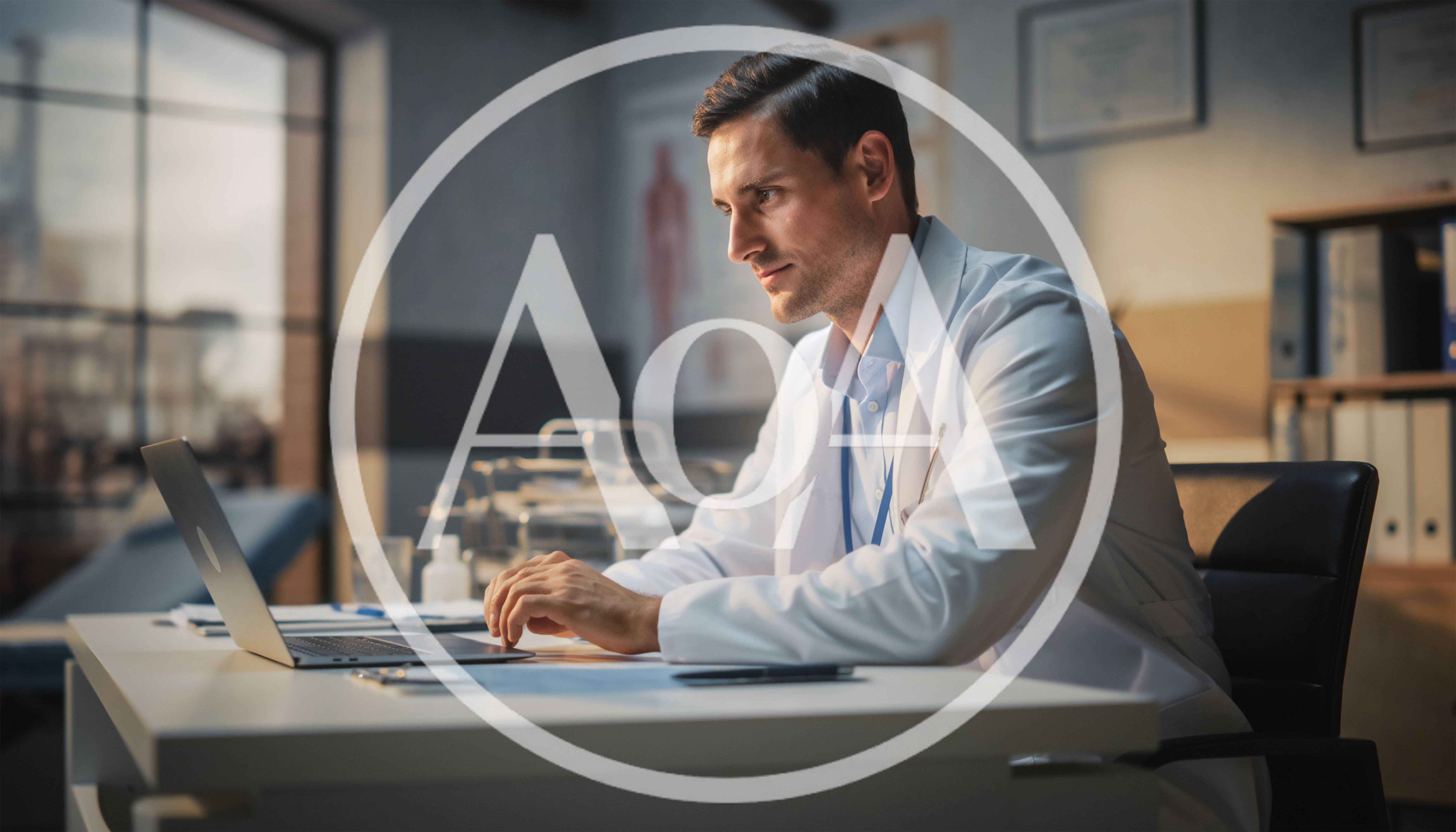 Male Doctor Working On Laptop In Medical Office