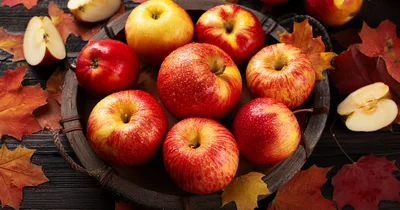 Fresh Red Apples In A Rustic Wooden Basket