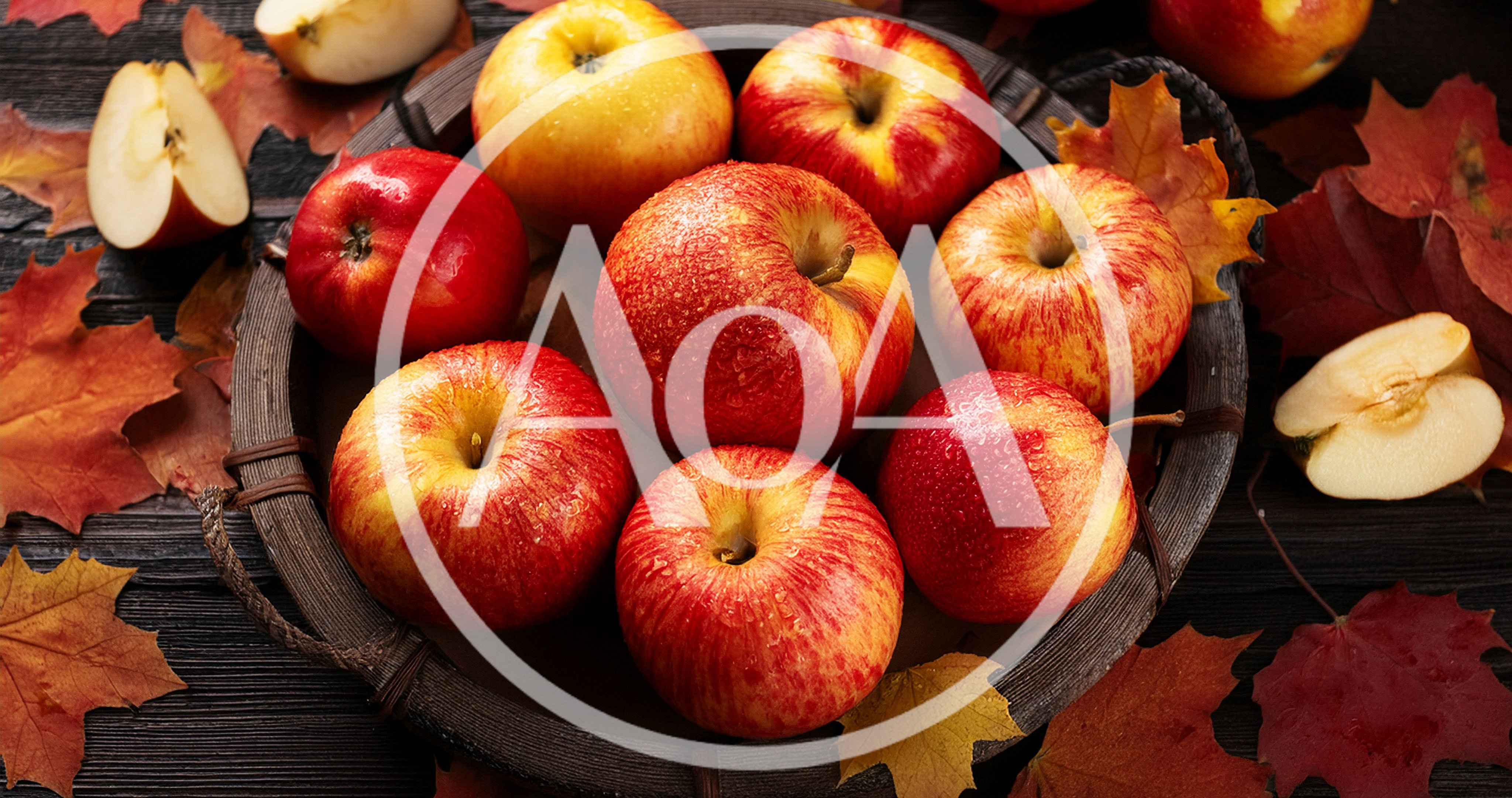 Fresh Red Apples In A Rustic Wooden Basket
