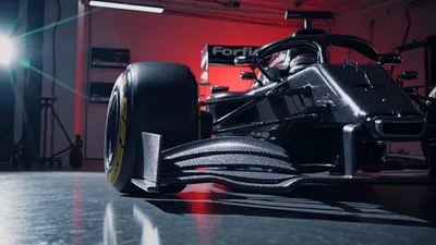 Black Formula One Race Car In Studio