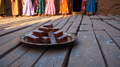 Traditional Indian Sweets Served On A Brass Plate