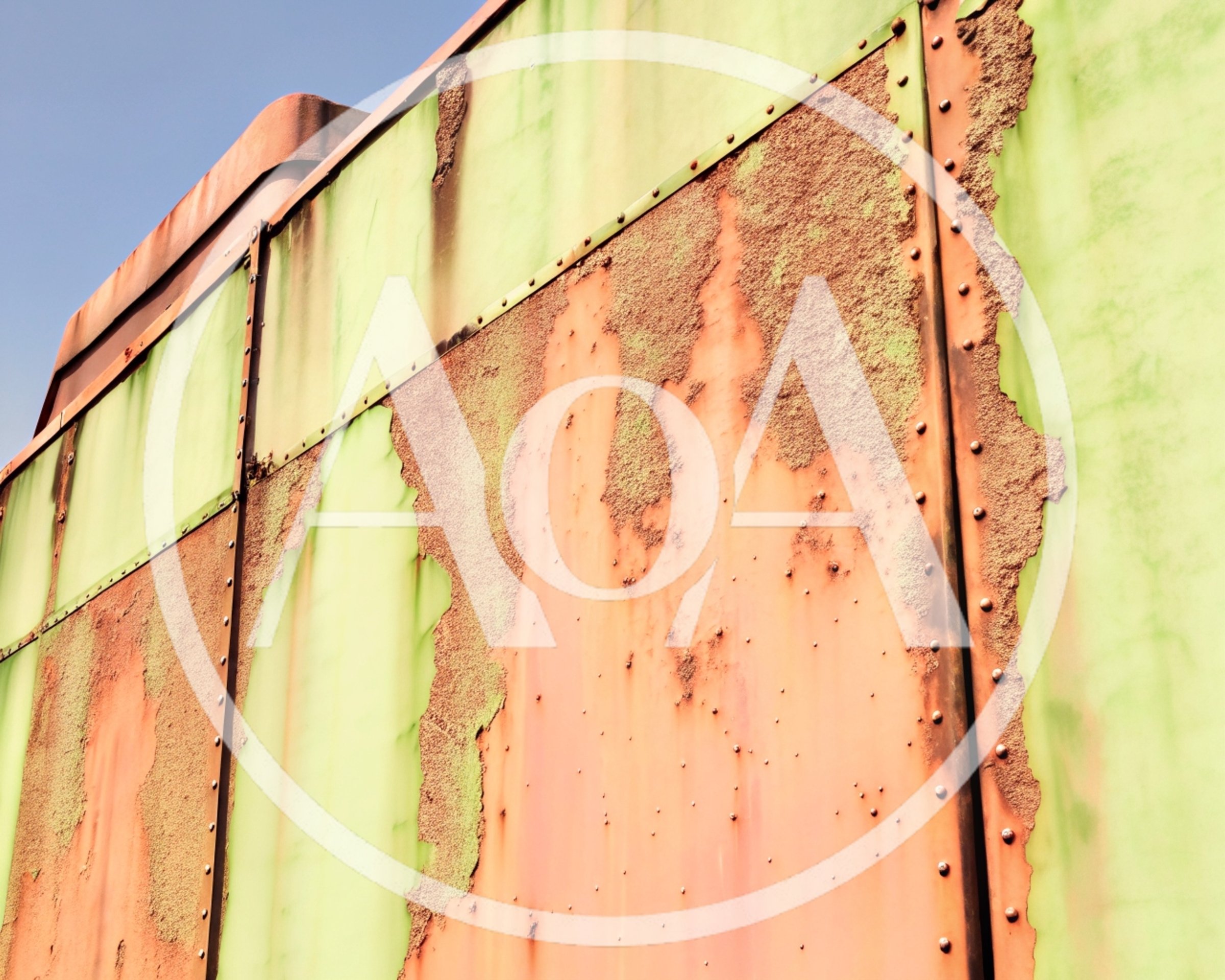 Weathered Green Metal Panel With Extensive Rust Damage