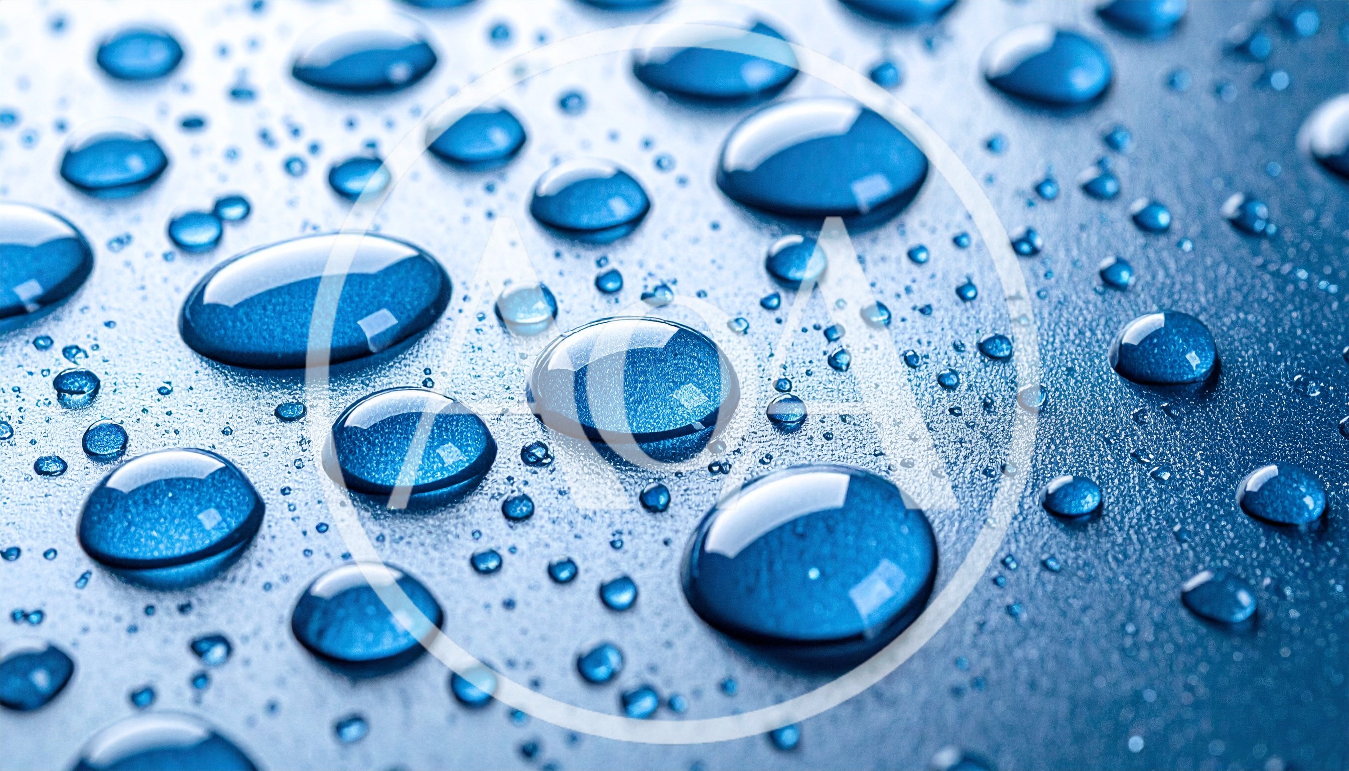 Blue Water Droplets On A Metallic Surface