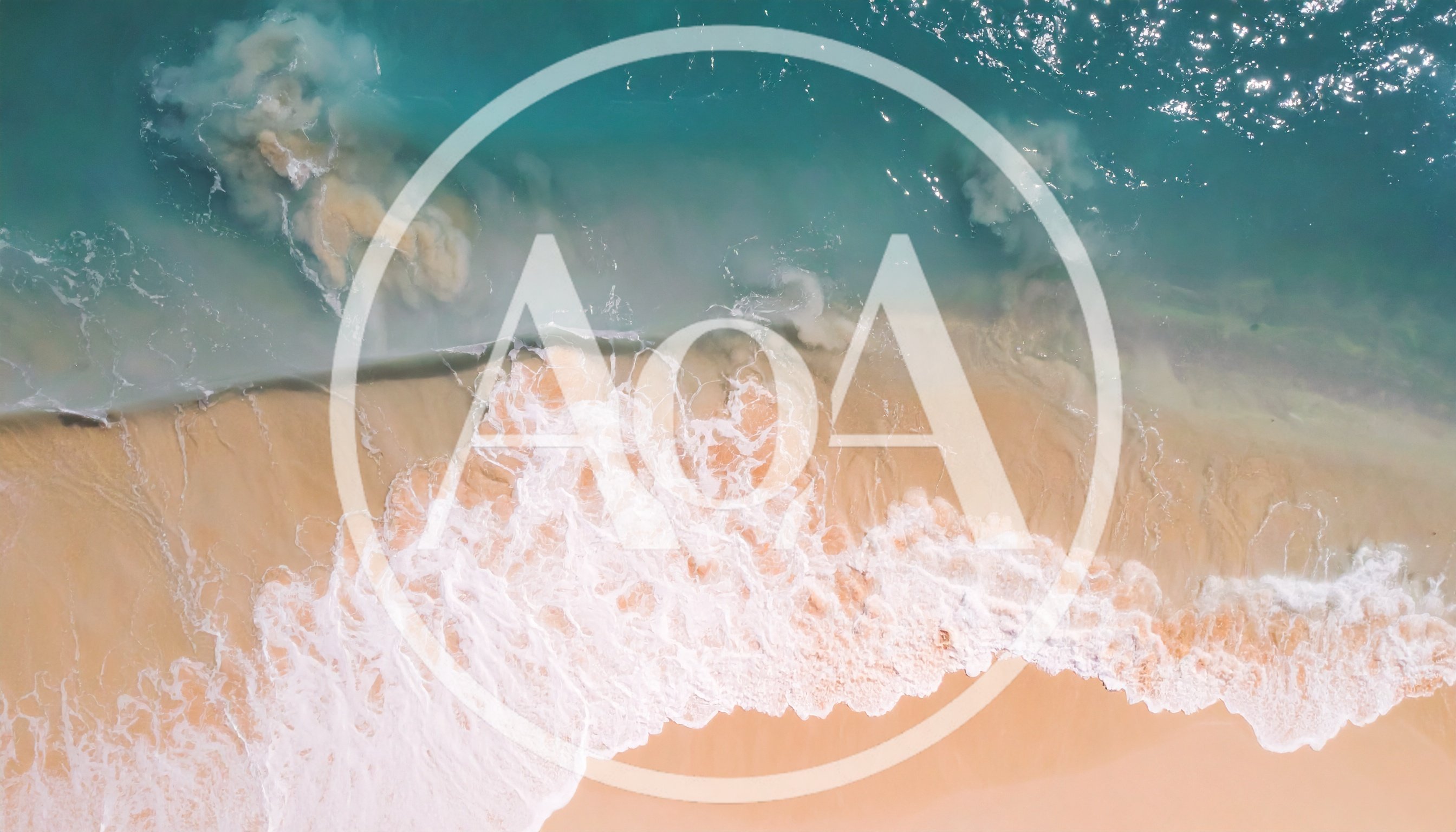 Aerial View Of Turquoise Ocean Waves Crashing On Beach