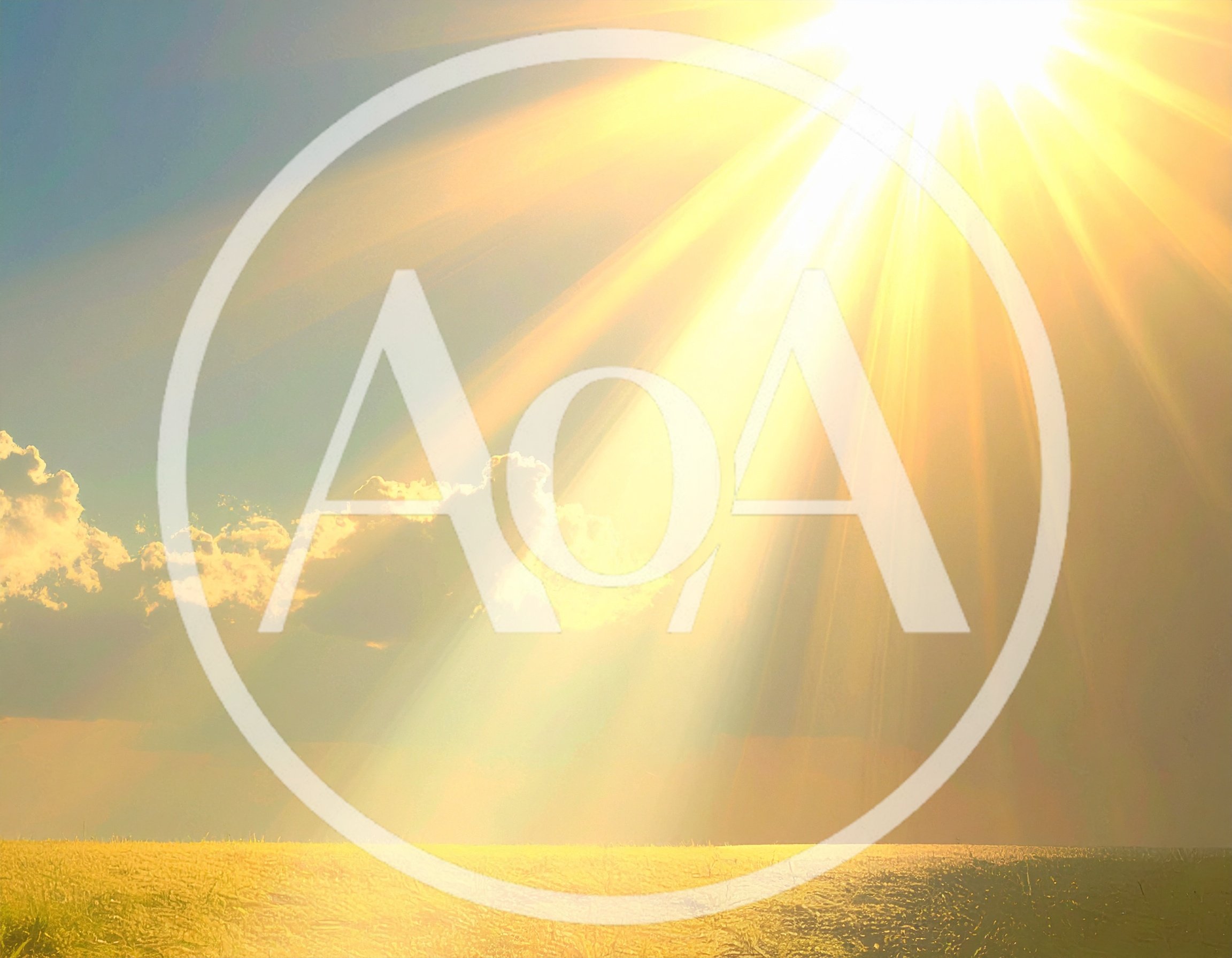 Golden Sun Rays Shining Over A Grassy Field
