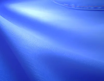 Abstract Blue Fabric Texture With Soft Folds