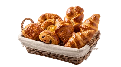 Assorted Fresh French Pastries In A Wicker Basket