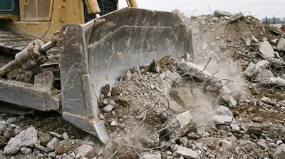 Bulldozer Pushing Concrete Rubble At Construction Site