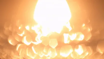 Abstract Bokeh Light Effect With Glowing Golden Orbs