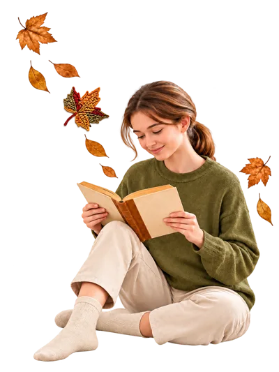 Young Woman Reading A Book Surrounded By Autumn Leaves