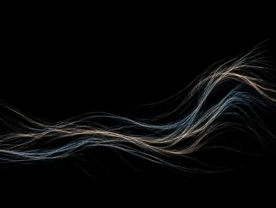 Abstract Flowing Light Trails On Black Background