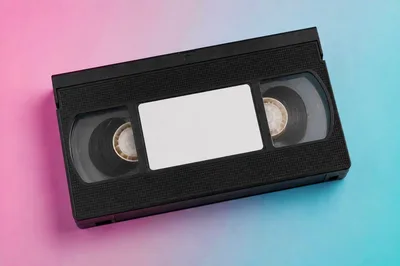 Black VHS Videocassette Tape On Gradient Background