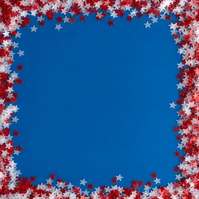 Red and White Star Confetti Border on Blue Background