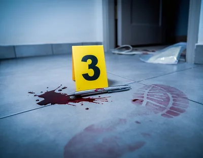 Crime Scene Investigation With Evidence Marker And Bloodstain
