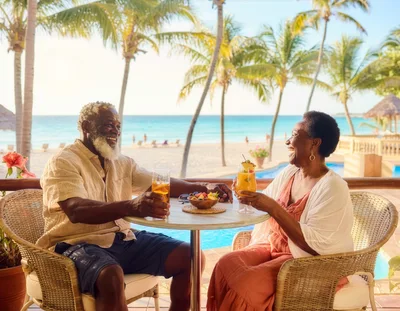 Senior Couple Enjoying Tropical Vacation Drinks