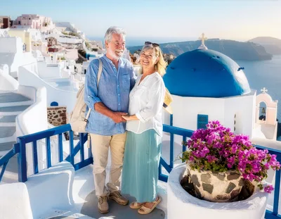Senior Couple Standing Together On A Santorini Terrace