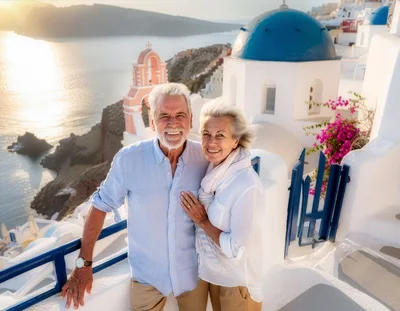 Senior Couple Enjoying Sunset Vacation in Santorini