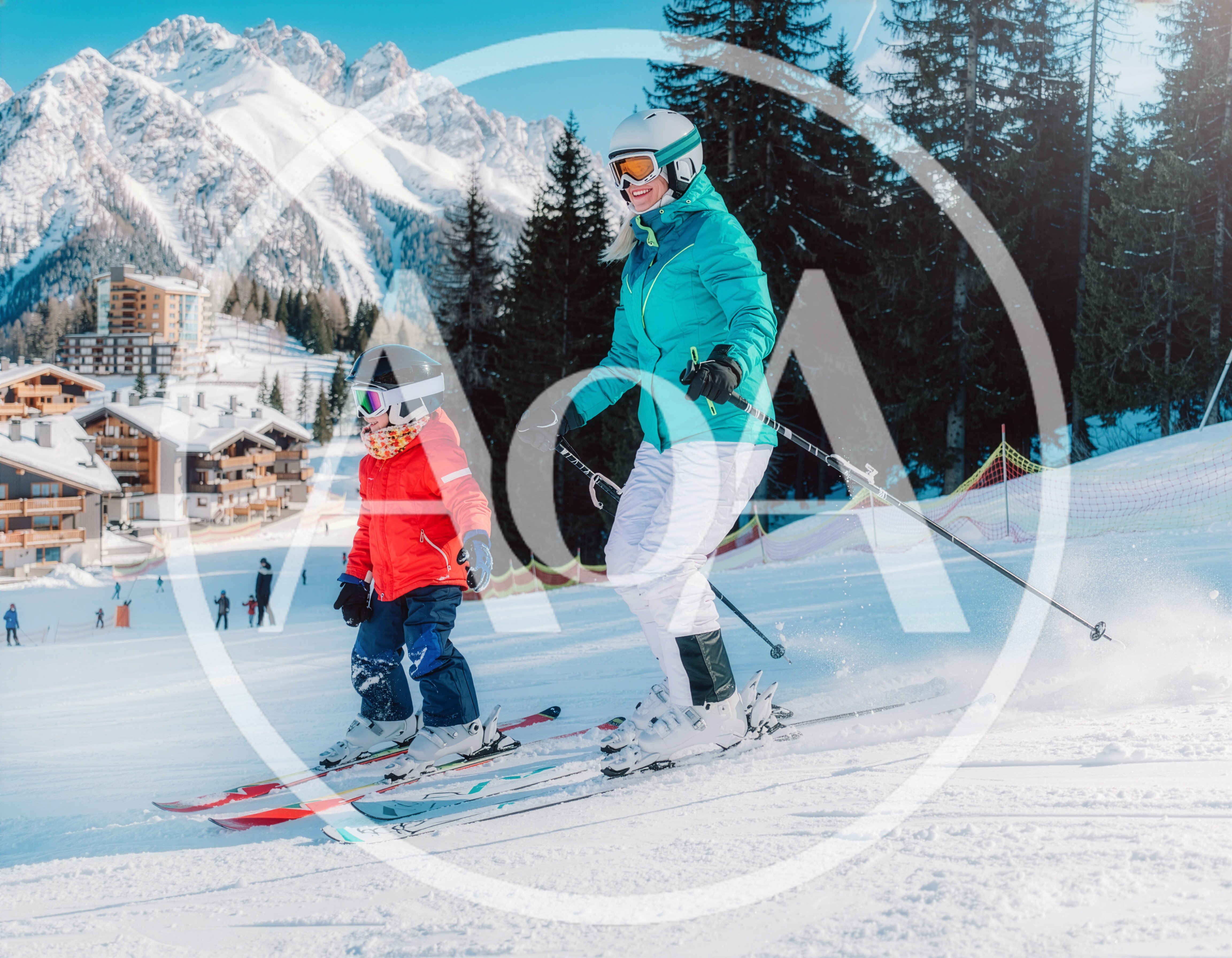 Mother and Child Skiing Together on Sunny Mountain Slope